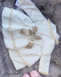 Stunning luxury puffball coat with bows and detailing on back