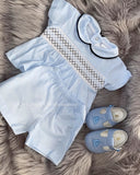 Sky blue smocked shorts and polo or romper