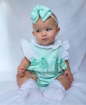 Luxe smocked turquoise blouse and shorts with frill sleeves