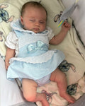 Luxury blue pinafore and blouse