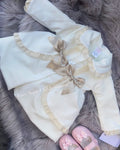 Stunning luxury puffball coat with bows and detailing on back
