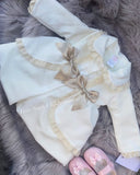 Stunning luxury puffball coat with bows and detailing on back