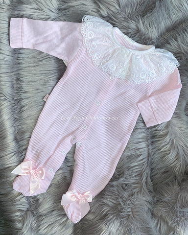 Stunning Frill collar sleepsuit with bows on feet