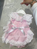 Stunning frilly dress with pants and ribbon tie on back