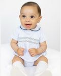 Sky blue smocked shorts and polo or romper