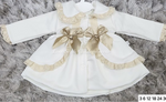 Stunning luxury puffball coat with bows and detailing on back