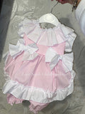 Stunning frilly dress with pants and ribbon tie on back
